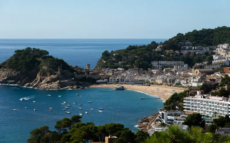 A bay and seaside town on the Costa Brava