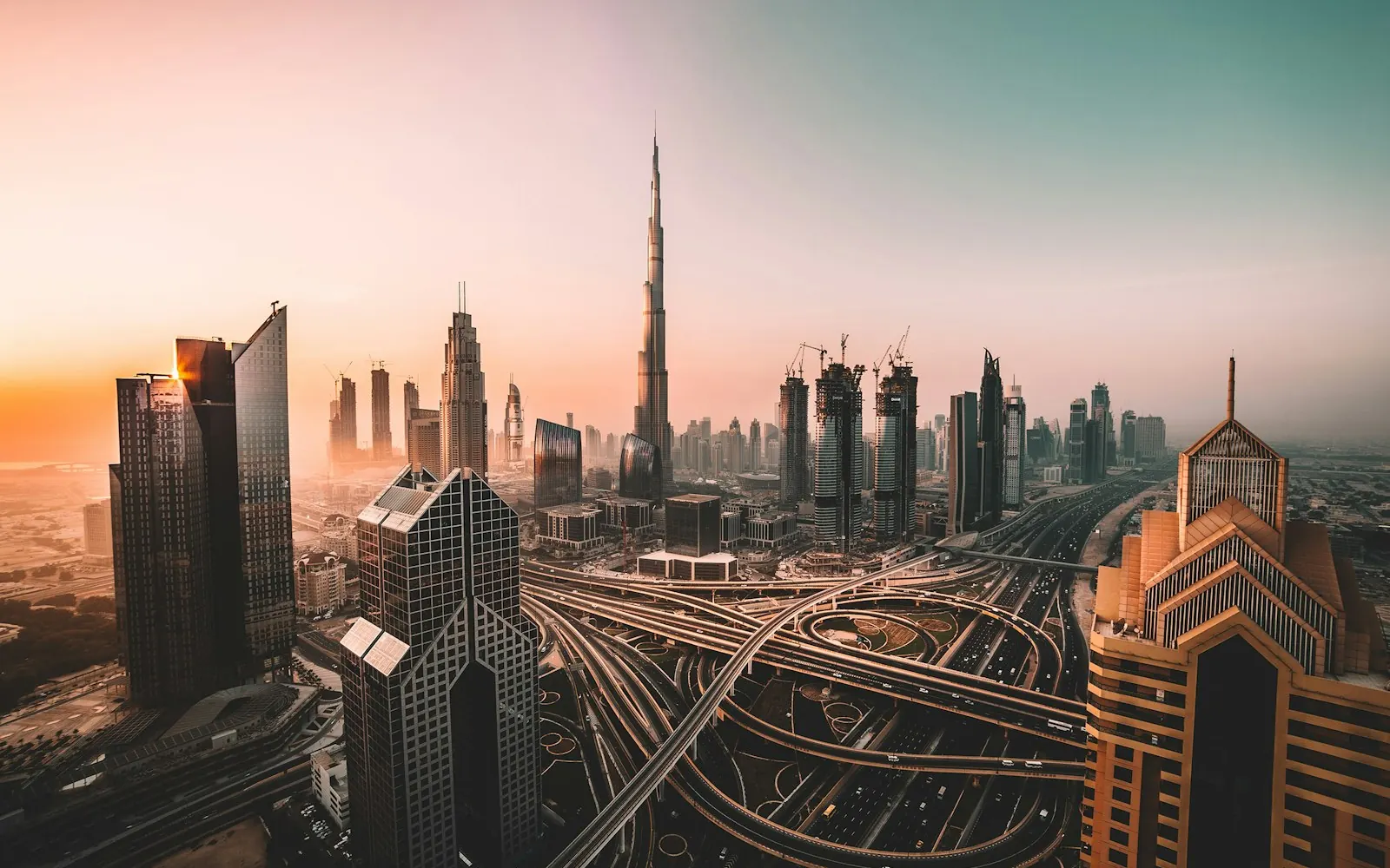 A city skyline at sunrise