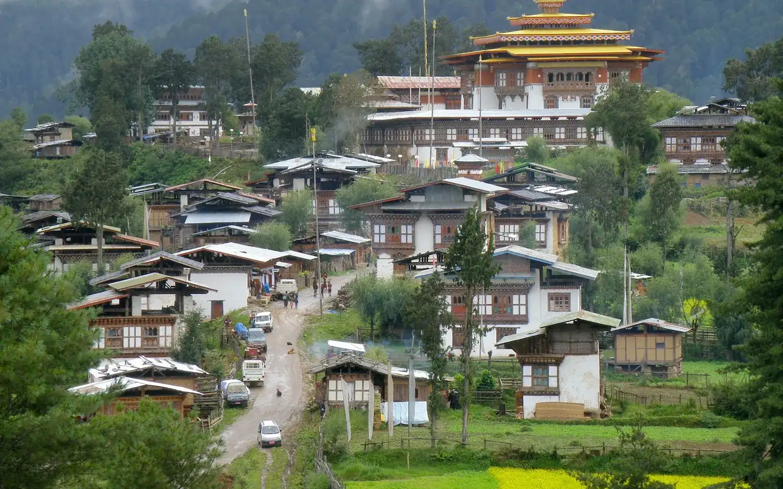 A village below a temple in the mountains